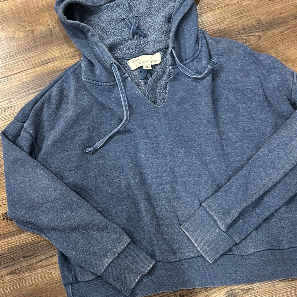 Blue hoodie with braid detail on hood and back